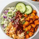 BBQ Chicken Bowls with Sweet Potatoes, Coleslaw, and Pickles Recipe