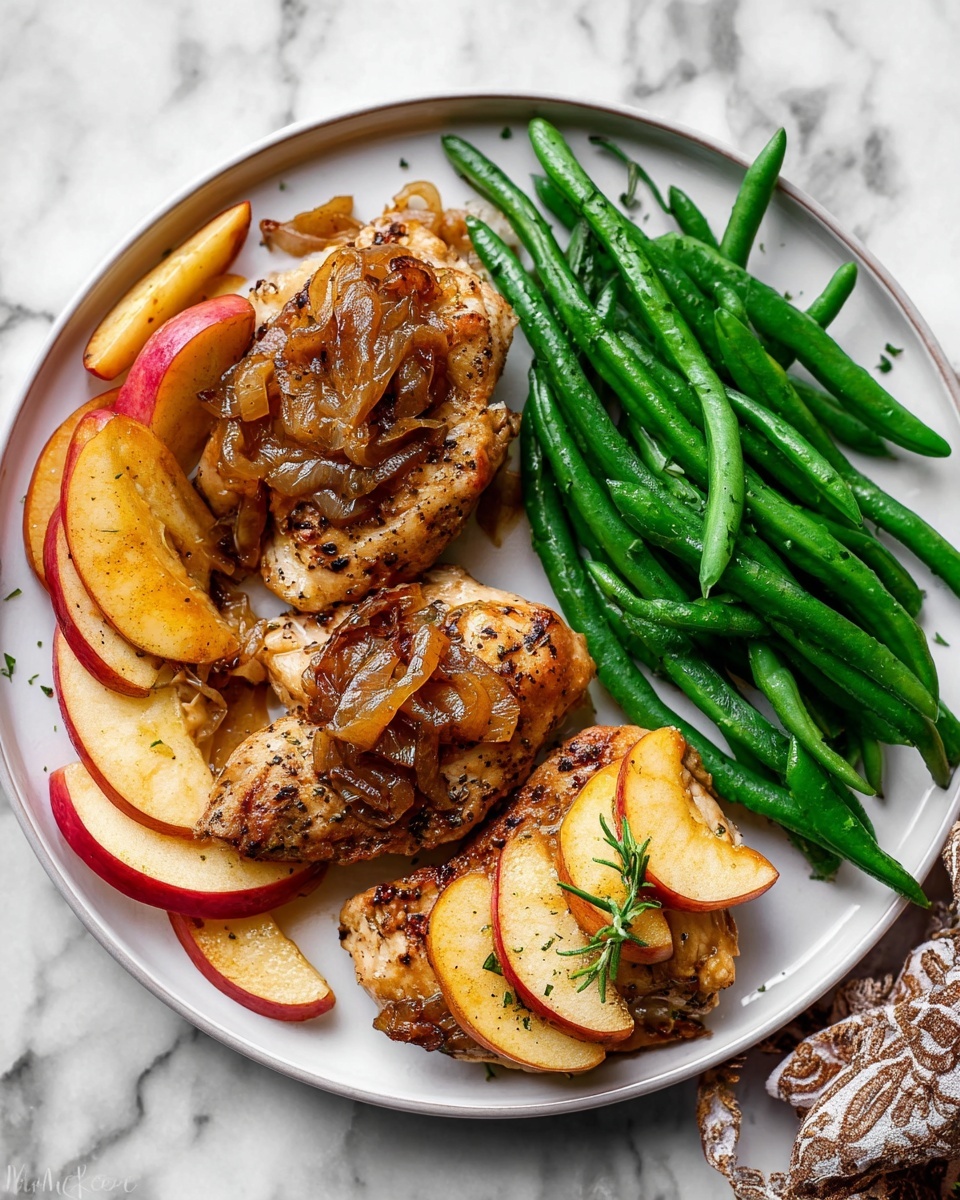 The dish on a white plate has three main parts: on the left, two pieces of cooked chicken with a golden brown color and a soft texture, topped with caramelized onions and surrounded by thin apple slices with red and yellow skin; on the right side, bright green cooked green beans piled neatly together; at the bottom right, another piece of chicken topped with a few more apple slices seasoned with spices. The plate is set on a white marbled surface with a wooden-handled fork resting on the left edge of the plate. Photo taken with an iphone --ar 4:5 --v 7