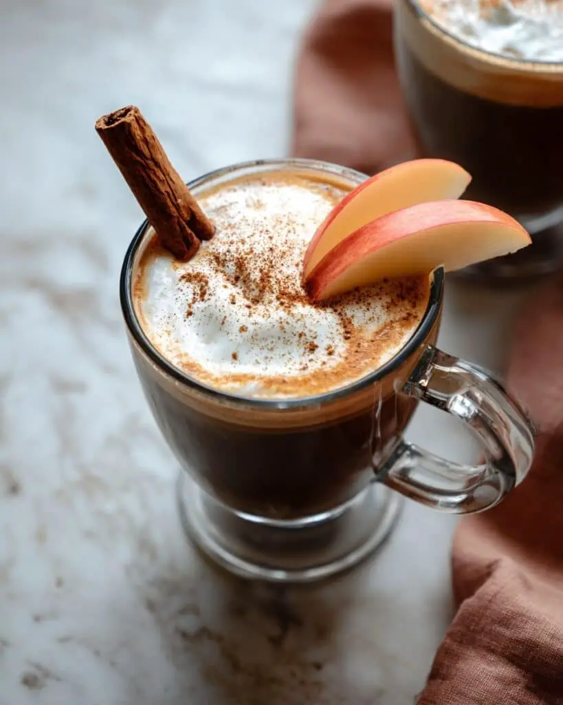 Pumpkin Apple Cider with Cinnamon-Spiced Whipped Cream Recipe
