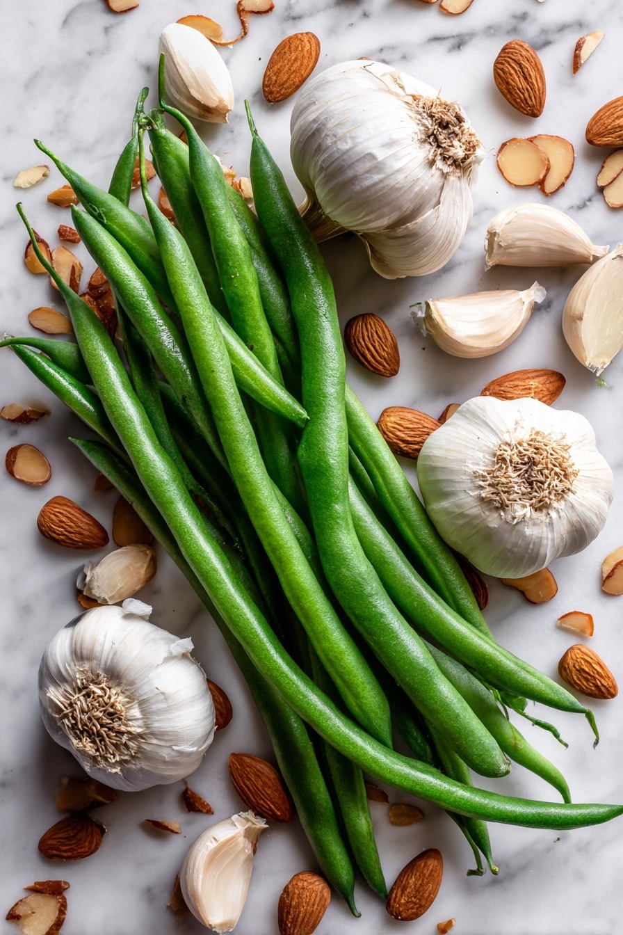 Flat lay of fresh bright green beans with their smooth, vibrant pods, scattered golden toasted almond slices with a crunchy texture, and several cloves of creamy white garlic with papery skins partially peeled to reveal the smooth surface inside, all arranged naturally with some almonds slightly overlapping the beans and garlic cloves placed nearby, placed on white marbled surface, photo taken with an iphone --ar 2:3 --v 7 - Green Beans Almondine, Green Beans Almondine recipe, almond green beans side dish, garlic green beans with almonds, quick green bean side dish
