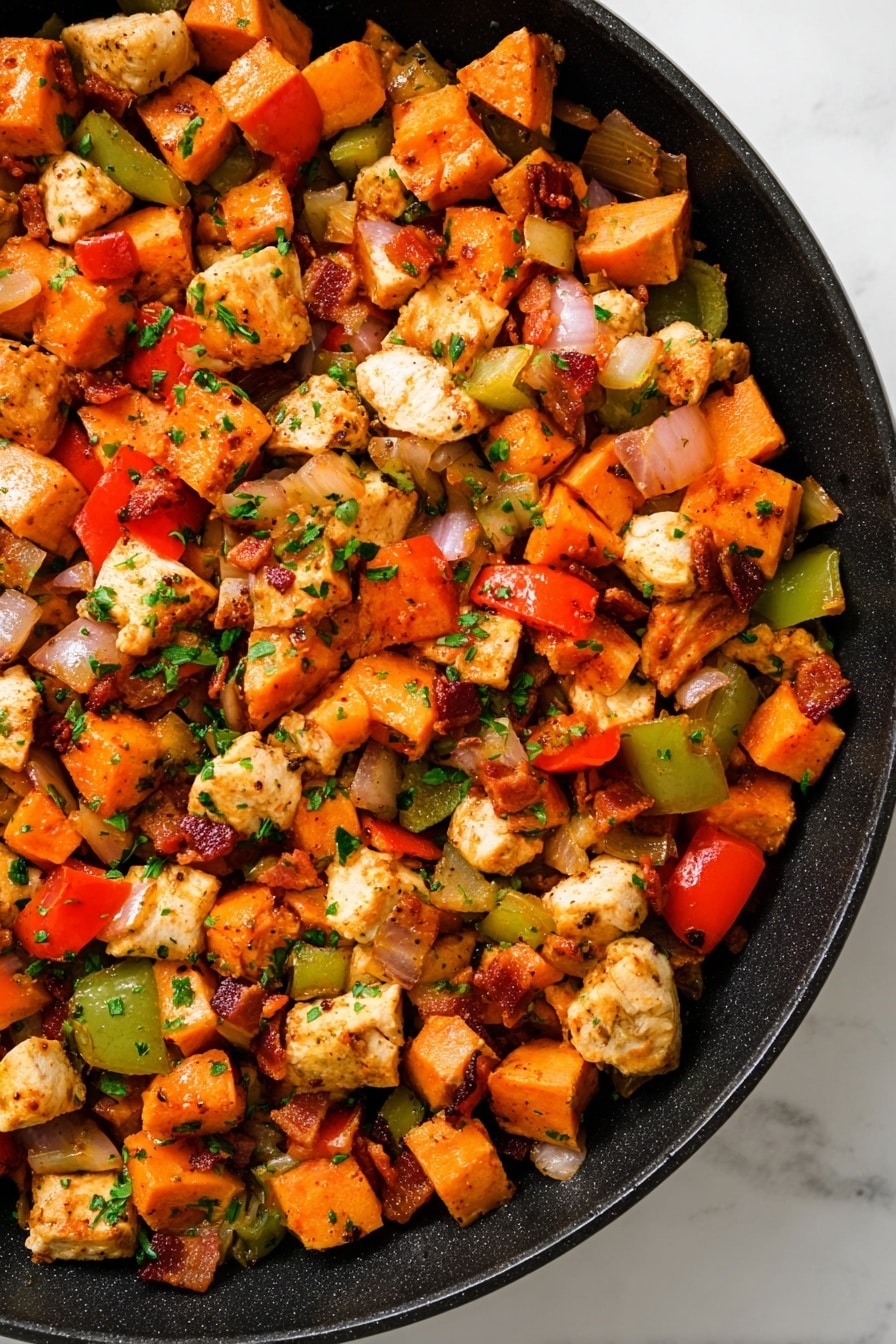 The image shows a white plate filled with a colorful mix of diced cooked vegetables and chicken pieces. The dish has three main layers: the base layer is made of bright orange sweet potato cubes, the middle layer contains chunks of white chicken and browned bits of bacon, and the top layer features small pieces of green bell pepper and red bell pepper. The vegetables and chicken are evenly mixed together, with some fresh green herbs sprinkled on top. A fork with a black handle rests on the left side of the plate, and the plate is set on a white marbled surface. The photo taken with an iphone --ar 2:3 --v 7 - Turkey Hash with Crispy Sweet Potatoes and Creole Seasoning, easy turkey hash recipe, flavorful sweet potato hash, savory brunch recipes, hearty weeknight dinners