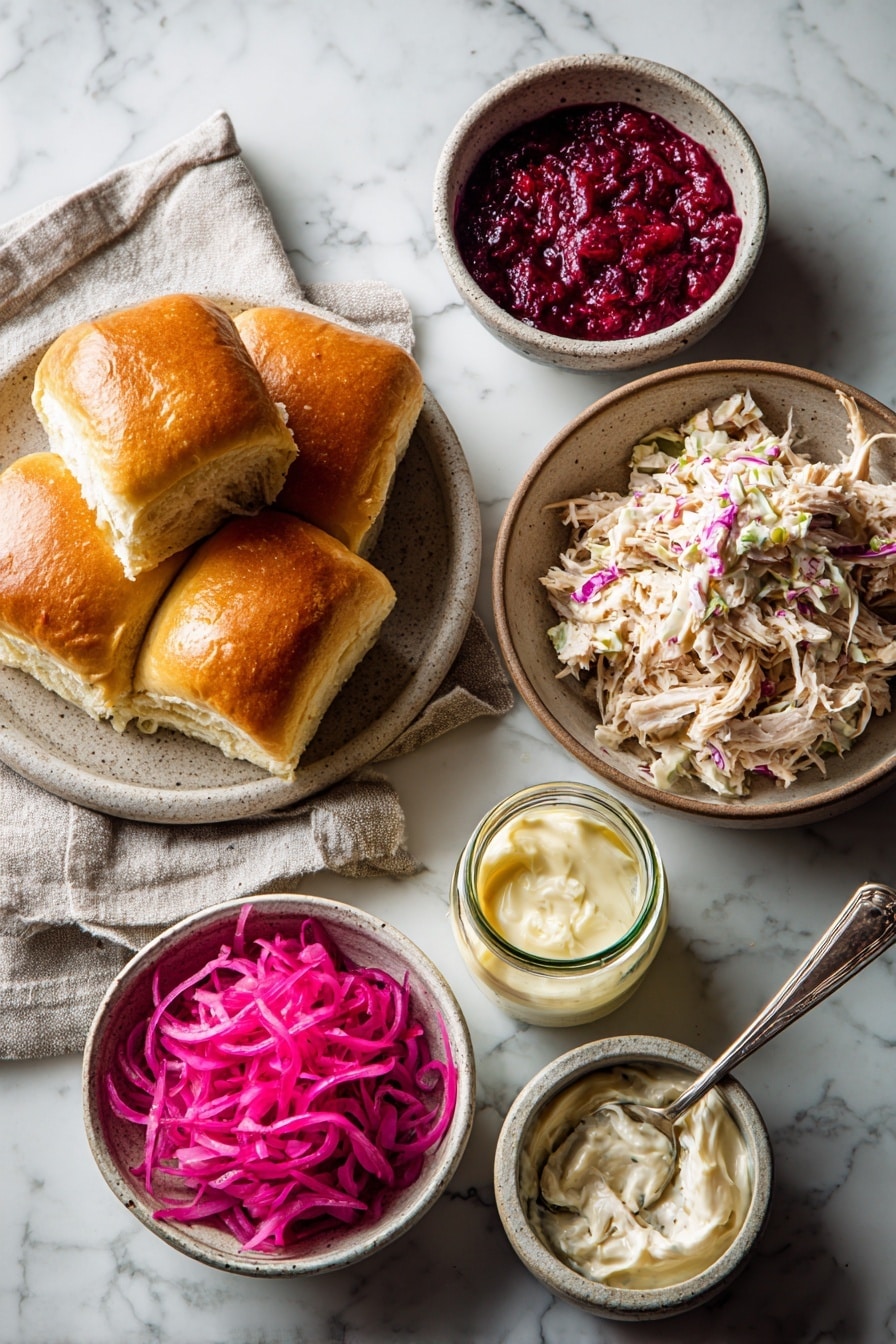 Flat lay of a small stack of golden Hawaiian rolls, a generous handful of shredded leftover turkey, a small bowl of deep red cranberry BBQ sauce, a bowl of creamy coleslaw with vibrant cabbage, a few bright pickled red onion slices, a small jar of glossy mayo, placed on a white marble surface, photo taken with an iphone --ar 2:3 --v 7 - Leftover Turkey Sliders, Turkey Sliders with Cranberry BBQ Sauce, Easy Turkey Slider Recipe, Holiday Leftover Sandwiches, Juicy Turkey Sliders