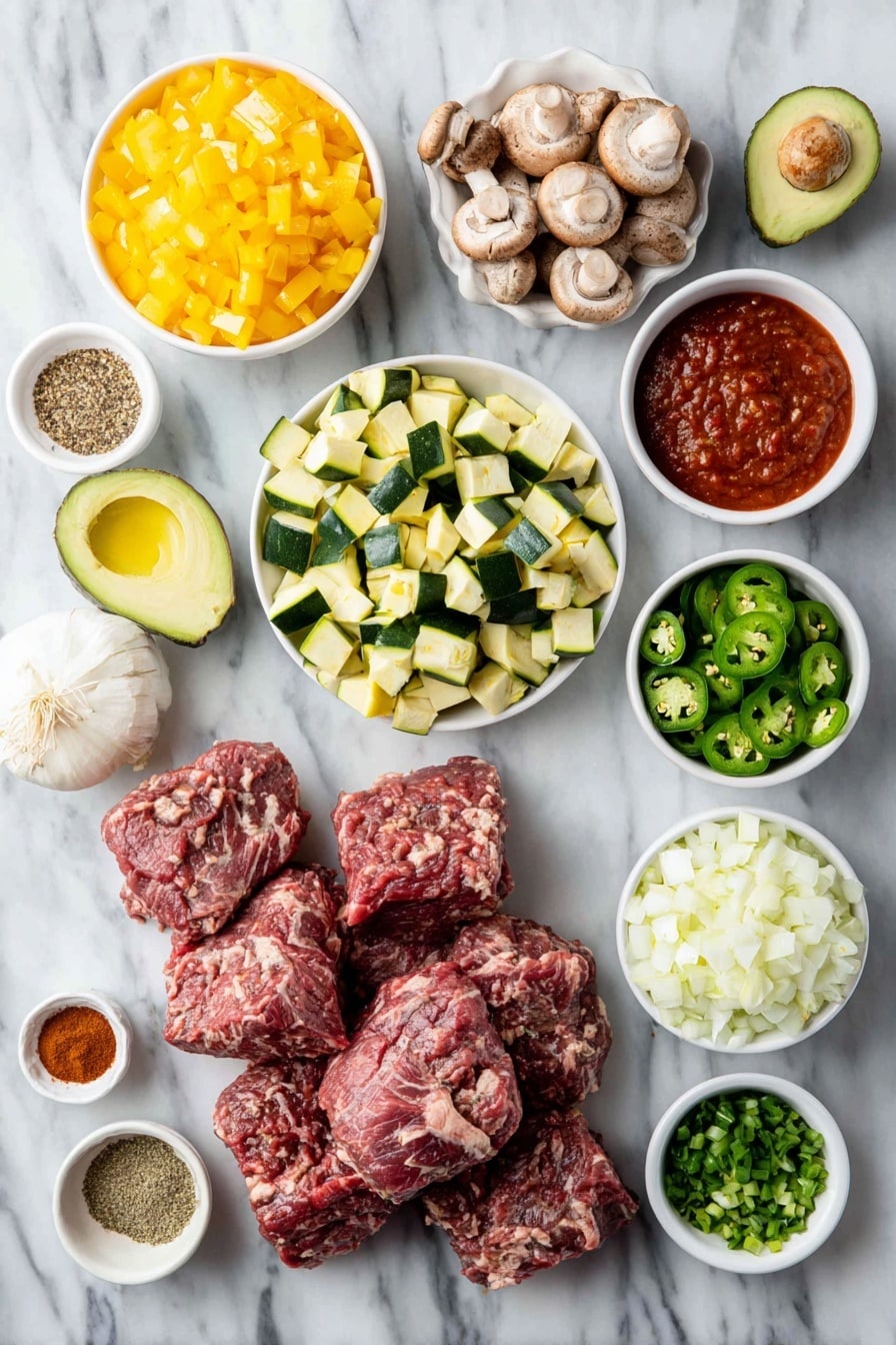Flat lay of fresh 1-inch pieces of chuck roast, raw ground beef mound, a large diced white onion, two diced bell peppers (one red, one yellow), two cups bright green diced zucchini, one cup roughly chopped brown mushrooms, five peeled garlic cloves, small white ceramic bowl of deep red tomato sauce, small white ceramic bowl of fire-roasted diced tomatoes, small white ceramic bowl of mild green chiles, small white ceramic bowl filled with rich beef stock, two whole fresh bay leaves, small white ceramic bowls with chili powder, ground cumin, and garlic powder each, small white ceramic bowl of extra-virgin olive oil, a few whole jalapeños sliced, diced ripe avocado chunks, fresh cilantro sprigs without stems, and chopped green onions, all arranged symmetrically on a clean white marble surface, soft natural light, photo taken with an iPhone, professional food photography style, fresh ingredients, white ceramic bowls, no bottles, no duplicates, no utensils, no packaging --ar 2:3 --v 7 --p awthu7i m7354615311229779997 - Crock-Pot Paleo Beef Chili, healthy beef chili, slow cooker paleo chili, low carb beef chili, hearty paleo dinner