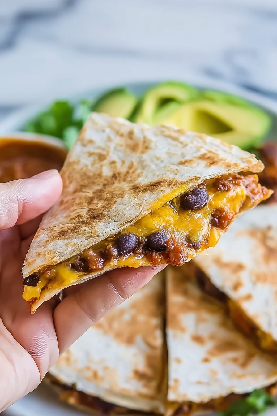 A woman's hand holding a single triangle slice of quesadilla with a light toasted golden brown flour tortilla on the outside. Inside the quesadilla, there are layers of melted yellow cheese, black beans, and a reddish-brown bean mixture slightly oozing out from the corner. The background shows the remaining quesadilla sliced into triangular pieces resting on a white marbled surface, along with some sliced avocado and part of a dish with brown sauce blurred behind it. Photo taken with an iphone --ar 2:3 --v 7 - Leftover Turkey and Black Bean Quesadillas, turkey leftover recipes, easy quesadilla recipes, quick dinner ideas, Thanksgiving leftovers ideas