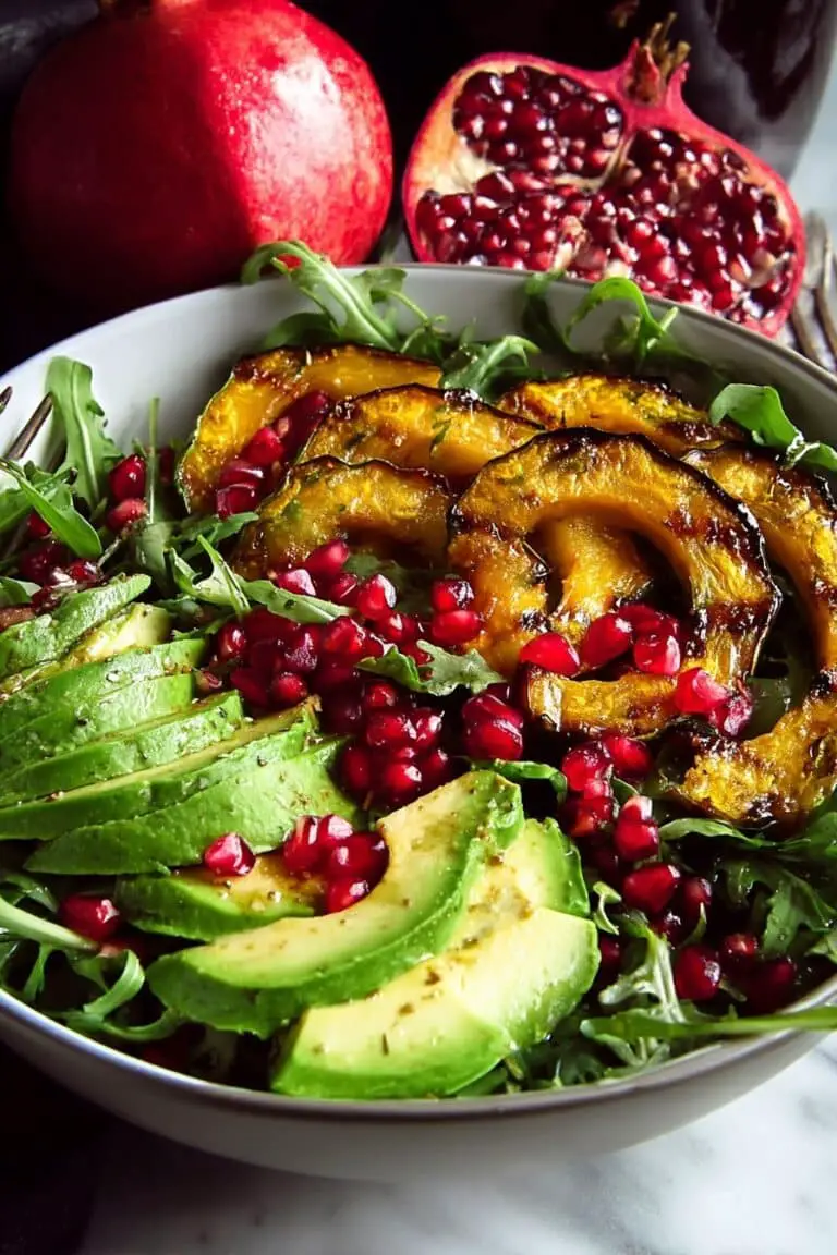 Autumn Arugula Salad with Roasted Acorn Squash, Pomegranate, and Ginger Vinaigrette Recipe