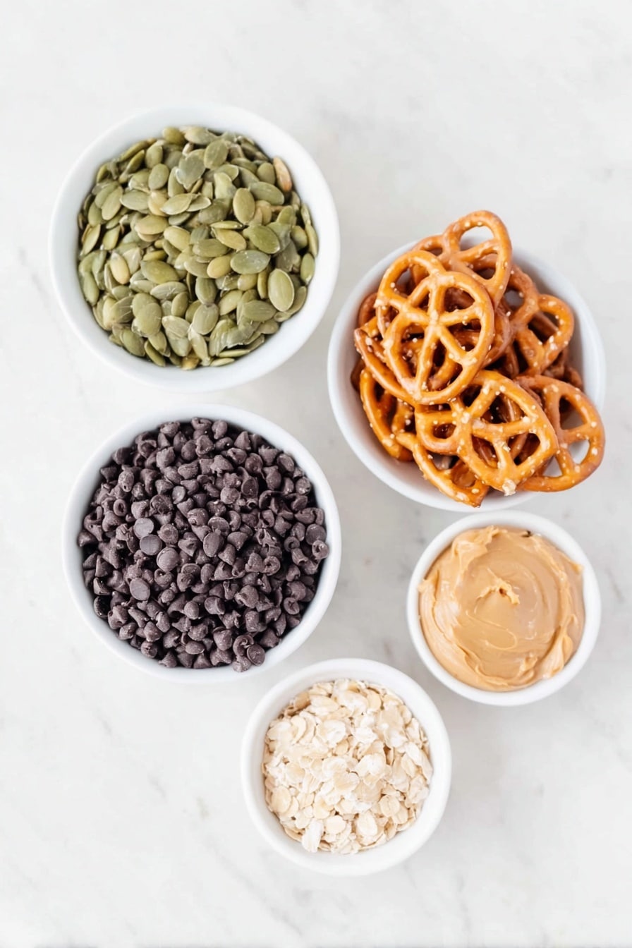 Flat lay of raw green pumpkin seeds in a small white ceramic bowl, lightly crushed golden pretzels neatly arranged on a white ceramic plate, semi-sweet glossy dark chocolate chips in a small white ceramic bowl, butterscotch chips with a creamy light caramel color in a small white ceramic bowl, and a dollop of smooth creamy peanut butter on a simple white ceramic dish, all perfectly spaced with balanced symmetry, placed on a clean white marble surface, soft natural light, photo taken with an iPhone, professional food photography style, fresh ingredients, white ceramic bowls, no bottles, no duplicates, no utensils, no packaging --ar 2:3 --v 7 --p m7354615311229779997 - Crockpot Chocolate Bars with Pretzels and Peanut Butter, easy crockpot desserts, no-bake chocolate treat, salty sweet snack, peanut butter chocolate bars