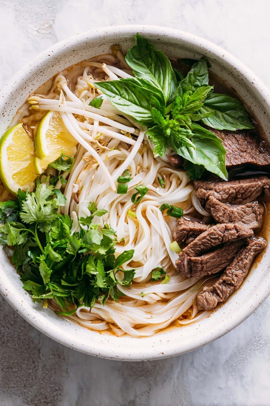 The image shows a bowl of beef noodle soup with three main layers: the bottom layer is light-colored flat rice noodles arranged loosely at the base; the middle layer has slices of dark brown cooked beef placed on top of the noodles; the top layer includes a few green leafy herbs and fresh sprouts mainly on the left side. The soup broth is a clear dark brown liquid filling the bowl and partially covering the noodles and beef. A woman's hand is holding a white soup spoon scooping up broth, noodles, and a piece of beef near the center. The bowl is white, and the background surface is a white marbled texture. Photo taken with an iphone --ar 2:3 --v 7 - Vietnamese Beef Noodle Soup, authentic Pho, homemade Vietnamese soup, beef noodle broth, Vietnamese noodle soup recipe