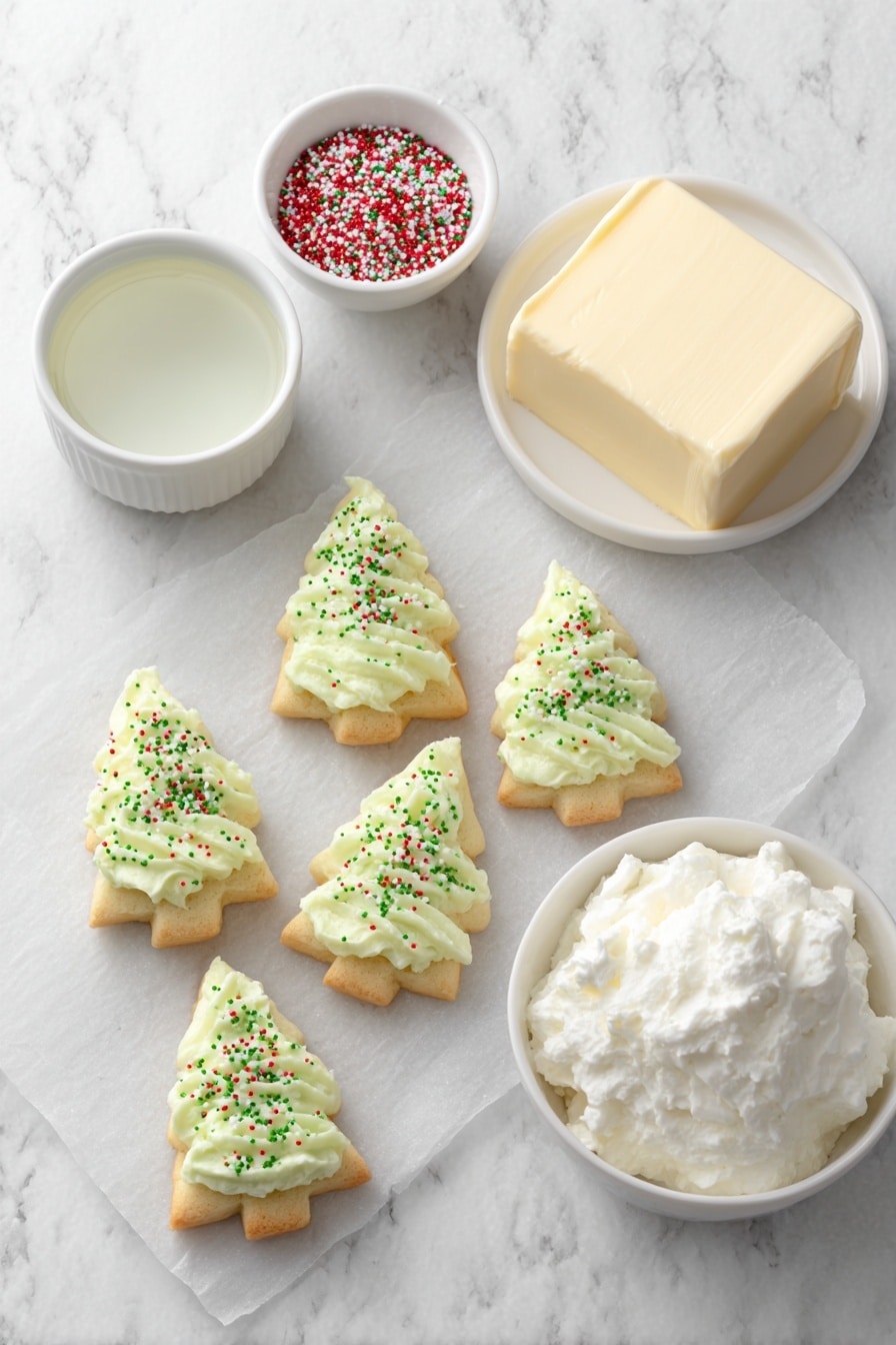 Flat lay of eight small Christmas tree-shaped cakes with green and red frosting arranged neatly, a block of soft cream cheese on a simple white ceramic plate, a small white bowl containing clear vanilla extract, a fluffy mound of white whipped topping in a white ceramic bowl, and a small white bowl filled with colorful Christmas-themed sprinkles, all placed on a clean white marble surface, soft natural light, photo taken with an iPhone, professional food photography style, fresh ingredients, white ceramic bowls, no bottles, no duplicates, no utensils, no packaging --ar 2:3 --v 7 --p m7354615311229779997 - Christmas Tree Cake Dip, festive holiday dip, quick holiday dessert, Christmas party appetizer, creamy cake dip