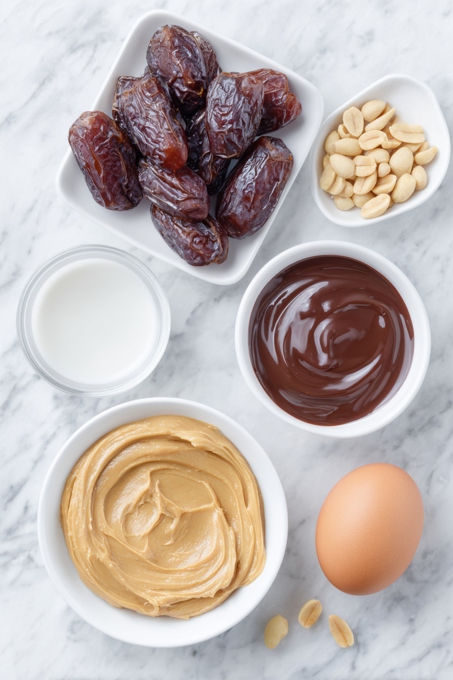 Flat lay of a small bowl of creamy peanut butter, a neat pile of glossy pitted Medjool dates, a single whole brown egg with a clean shell, a small white bowl filled with melted dark chocolate, a few scattered roasted peanuts, and a small white bowl containing clear vanilla extract, all arranged symmetrically on simple white ceramic dishes, placed on a clean white marble surface, soft natural light, photo taken with an iPhone, professional food photography style, fresh ingredients, white ceramic bowls, no bottles, no duplicates, no utensils, no packaging --ar 2:3 --v 7 --p m7354615311229779997 - Chocolate Dipped Peanut Butter Cookies, peanut butter cookies with chocolate, healthy peanut butter cookies, easy homemade cookies, decadent chocolate cookies