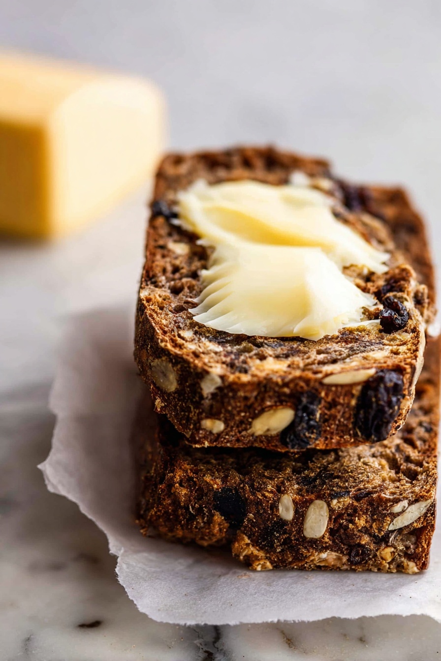 The image shows several thin, dark brown slices of raisin bread stacked in the center on white parchment paper with one slice slightly separated, topped with a pale yellow spread and garnished with a small green herb. To the left is a metallic butter knife spreading the same yellow spread on another slice. At the top right, a bunch of red grapes with green stems rests on the white marbled surface. On the bottom right, there is a white round cheese on white wrapping paper with one piece cut out, showing a creamy yellow inside, and nearby, a white bowl contains red stuffed peppers sitting in golden oil. Photo taken with an iphone --ar 2:3 --v 7 - Crunchy Cranberry Homemade Crackers, Cranberry Crackers Recipe, Healthy Cranberry Crackers, Easy Homemade Crackers, Cranberry Snack Ideas
