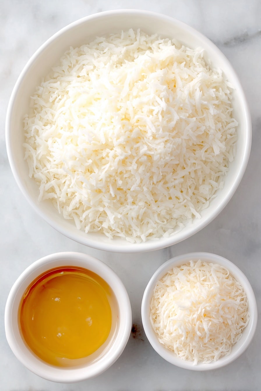 Flat lay of a medium white ceramic bowl filled with finely shredded fresh desiccated coconut, a small white ceramic bowl containing glossy sweetened condensed milk, and a small white ceramic bowl holding a light mound of extra shredded coconut flakes, arranged with perfect symmetry and balanced proportions, placed on a clean white marble surface, soft natural light, photo taken with an iPhone, professional food photography style, fresh ingredients, white ceramic bowls, no bottles, no duplicates, no utensils, no packaging --ar 2:3 --v 7 --p m7354615311229779997 - Chocolate Coconut Truffle Balls, Tropical Dessert Treats, Easy No-Bake Truffles, Coconut Dessert Recipes, Party Dessert Ideas