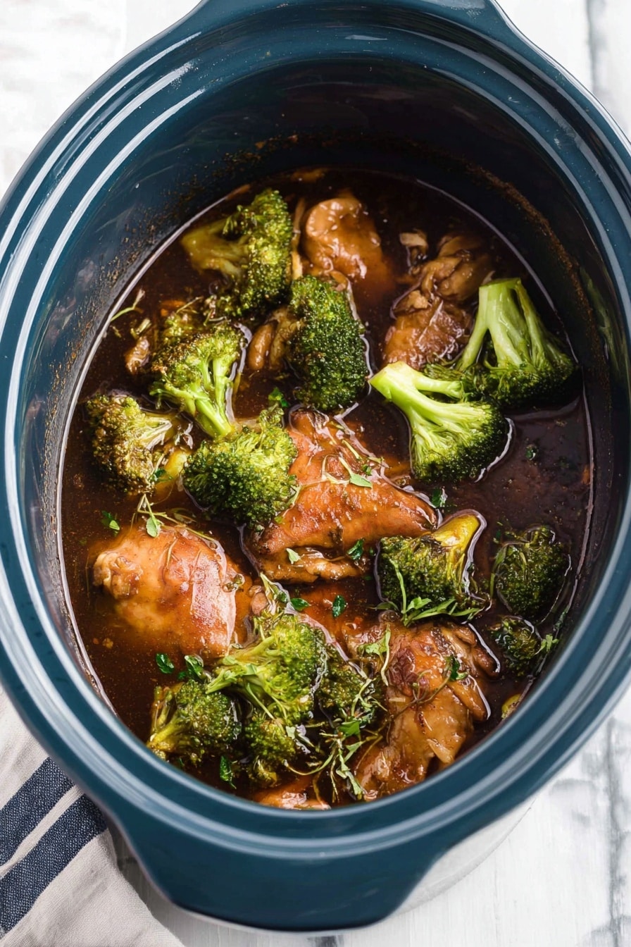 The image shows a bowl with three main layers: the bottom layer has white cooked rice with a soft texture; on top of the rice is a layer of green broccoli florets, cooked but still fresh and bright; the top layer has shiny pieces of cooked chicken covered in a brown sauce, sprinkled with white sesame seeds and small pieces of green onion. A pair of wooden chopsticks holds a piece of chicken above the bowl. The bowl is white, sitting on a white marbled surface. Photo taken with an iphone --ar 2:3 --v 7 - Crockpot Broccoli Chicken, slow cooker chicken and broccoli, easy healthy crockpot dinner, flavorful slow cooker chicken recipes, effortless crockpot chicken dish