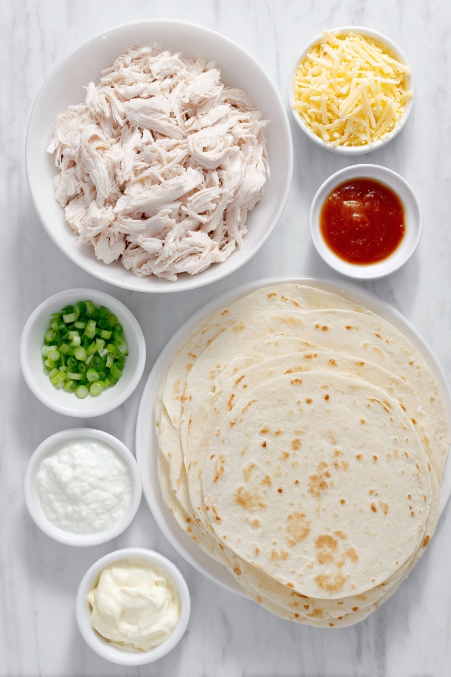 Flat lay of shredded rotisserie chicken in a simple white ceramic bowl, a small white bowl of bright orange buffalo sauce, a small white bowl holding softened cream cheese, a small white bowl with dry ranch seasoning mix, a small white bowl with shredded Monterey Jack cheese, a small white bowl with shredded sharp cheddar cheese, eight large fresh flour tortillas stacked neatly on a white ceramic plate, a small white bowl of ranch dressing, and a few sprigs of chopped green onions scattered artistically, all placed on a clean white marble surface, soft natural light, photo taken with an iPhone, professional food photography style, fresh ingredients, white ceramic bowls, no bottles, no duplicates, no utensils, no packaging --ar 2:3 --v 7 --p m7354615311229779997 - Buffalo Chicken Enchiladas, spicy chicken enchiladas, cheesy Buffalo chicken casserole, quick chicken enchiladas, easy Tex-Mex dinner